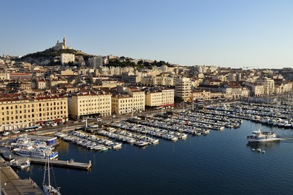 France, Bouches du Rhone, Marseille, the Vieux Port, quai de Rive Neuve and quai de la Fraternite, Notre Dame de la Garde in the background