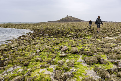 France, Cotes d'Armor, Grand Site de France Cap d'Erquy - Cap Frehel, Erquy, the Saint-Michel islet topped by the Saint-Michel chapel accessible on foot at low tide via a tombolo
