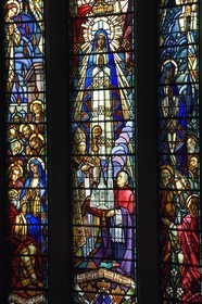 France, Allier (03), Vichy, Notre Dame des Malades (Our Lady of the Sick) church and Saint Blaise church, vitraux réalisés par les frères Mauméjean en 1933, detail of the Coronation of the Virgin showing the church offering to the bishop