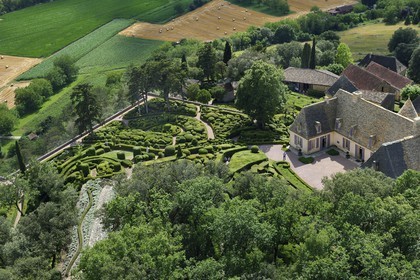 France, Dordogne, Perigord Noir, Dordogne Valley, Vezac, Les Jardins du château de Marqueyssac of the 18th century, park and castle (aerial view)