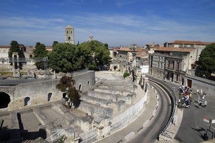 France, Bouches du Rhone, Arles, the Roman theater 1st century BC and the belfry of the  Saint Trophime church of the 12-15th century, both listed as World Heritage by UNESCO