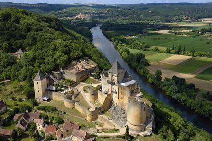 France, Dordogne, Perigord Noir, Dordogne Valley, Castelnaud la Chapelle, labelled Les Plus Beaux Villages de France (The Most Beautiful Villages of France), Castelnaud Castle on a cliff above the Dordogne valley (aerial view)