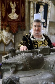 France, Finistere, Locronan, labelled Les plus Beaux Villages de France (The Most Beautiful Villages of France), women in traditional costume during the Tromenie around the cenotaph of St Ronan in Peniti chapel adjacent to the Saint Ronan church