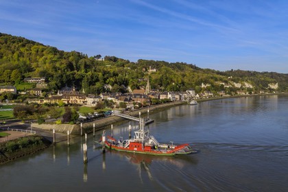 France, Seine-Maritime, Norman Seine River Meanders Regional Nature Park, the ferry crossing the Seine river at the village of La Bouille (aerial view)