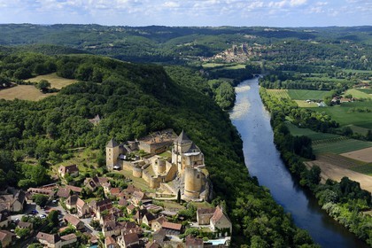 France, Dordogne, Perigord Noir, Dordogne Valley, Castelnaud la Chapelle, labelled Les Plus Beaux Villages de France (The Most Beautiful Villages of France), Castelnaud Castle on a cliff above the Dordogne valley (aerial view)